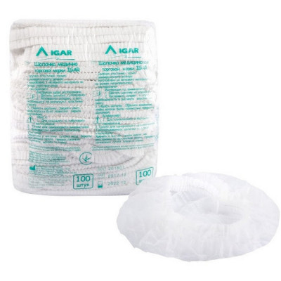 Шапочка медична IGAR з нетканого дихаючого матеріалу біла на щільній та еластичній резинці 100 штук Шапочка медична IGAR з нетканого дихаючого матеріалу біла на щільній та еластичній резинці 100 штук