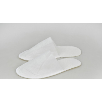 Тапочки одноразові Panni Mlada для готелей саун та салонів краси білі 40-44р 1пара Тапочки одноразові Panni Mlada для готелей саун та салонів краси білі 40-44р 1пара